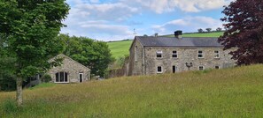 View up the meadow to the Argideen Lodges