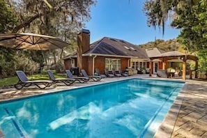 This beautiful house has 4BR/2.5BA and a heated pool!