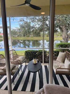 Enclosed Lanai overlooking the beautiful pond.  