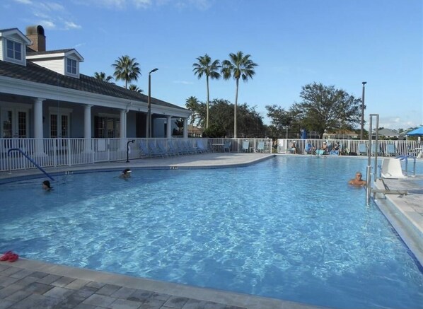 Community Pool with lounge chairs and Hot Tub