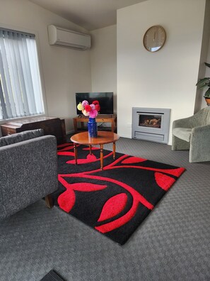 Loungeroom with Gas heater or Heat pump