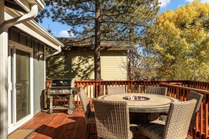 Kick back at the fire table after grilling up one of your favorite meals on the natural gas line BBQ.