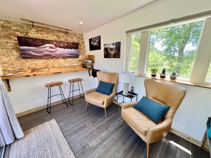 Seating area, perfect for reading a book or having a cup of coffee