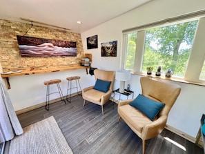 Seating area, perfect for reading a book or having a cup of coffee