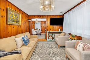 Cozy Living Room With Pull Out Couch & Smart TV