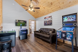 Play All Day in Arcade Game Room with Pinball, Multicade, Golf-Bags-Darts