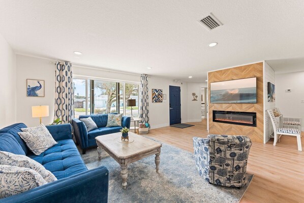 Coastal charm meets cozy comfort! Relax in this bright, stylish living space and make unforgettable memories.