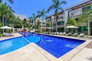 The beautiful 83-foot long swimming pool at Via 38