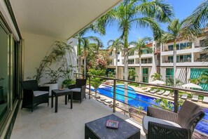 A private balcony overlooking the pool