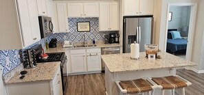Brand new Kitchen, huge pantry, coffee station.  Fully loaded kitchen!!