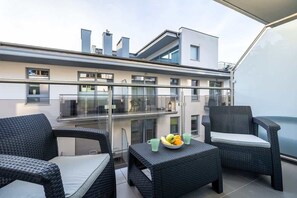 A lovely outdoor space with seating, offering a perfect spot to relax and enjoy the surroundings.