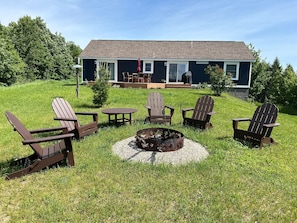 Outdoors - 3+ private acres, deck, outdoor chairs, gas grill, fire pit, corn hole.
