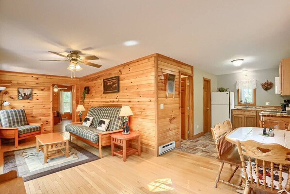 Open concept living room, dining area and kitchen