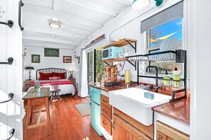 The transformed caboose welcomes you with a warm and charming interior