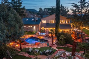 Landcaped Back Yard - Enchanted Desert Oasis - Vivid Vacation Re - Evening Pool Side Exterior View 77 Wild Horse Mesa Drive, Village of Oak Creek, Sedona AZ - 4-5Bd House Sleeps 10-12