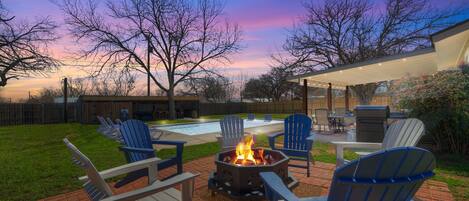Gather around the firepit on a cool evening.