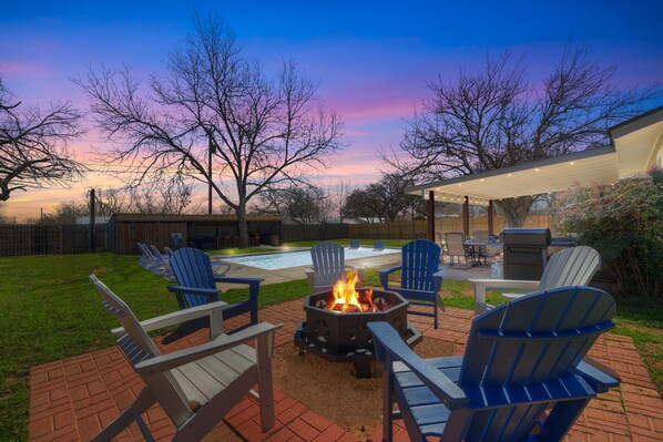 Gather around the firepit on a cool evening.