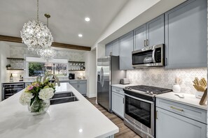 Stainless steel amenities in the updated kitchen.