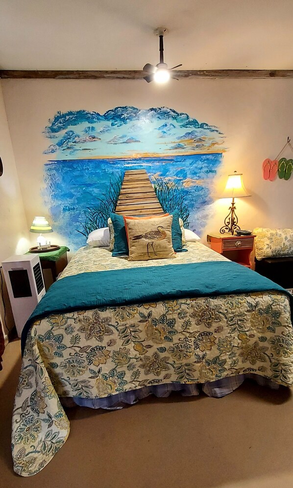 Painted headboard in 4th bedroom, with a bathroom, I like to get artsy!