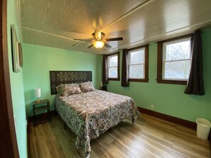 The front bedroom has great light and a walk in closet with a dresser in it.