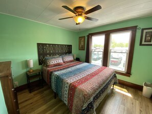 The side bedroom has a comfy, queen bed and built-in dresser.  I love built-in's