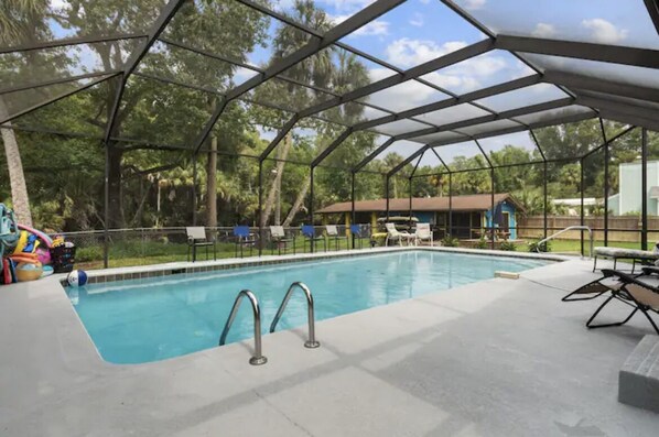 From the pool see the beauty of the river and nature preserve in backyard.