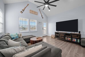 Smart TV in living room and each of the bedrooms.  
