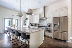 Full kitchens with stainless steel appliances