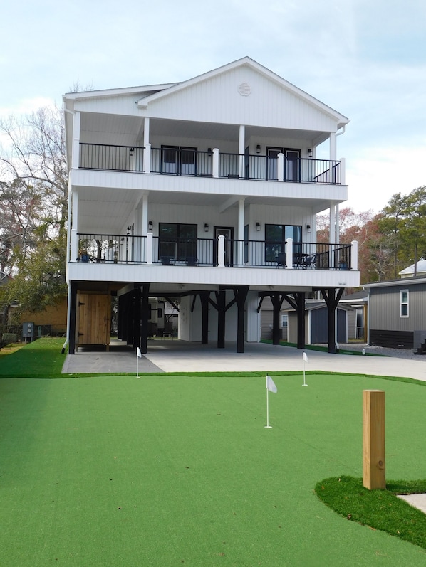 Ocean Lakes Site MH-408 with personal putting green out front!