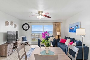 Comfortable seating with Smart TV and cable included.  Couch unfolds out to queen size bed.  The views are incredible and the sounds of the ocean are amazing.