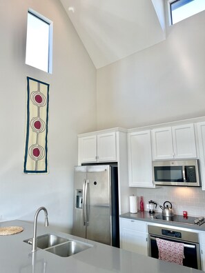 Stainless steel appliances and local art