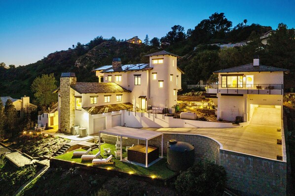 A nighttime view of The Malibu Cloud House in Malibu, California!