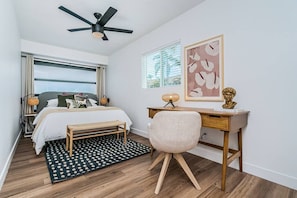 Escape to comfort and style in our cozy queen bedroom – where every corner is designed with your relaxation in mind.