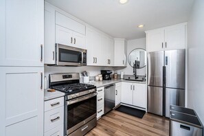 Indulge your culinary creativity in our well-stocked kitchen – everything you need to whip up a delicious feast!
