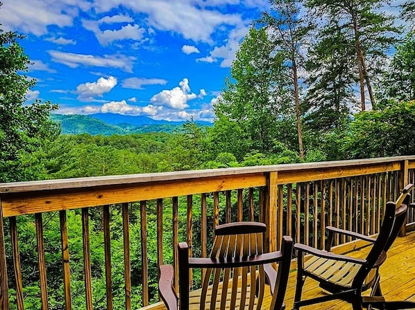 Relax in the rocking chairs while enjoying unobstructed views of Mt. Le Conte.