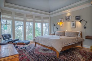 Experience modern luxury with this spacious and stylish bedroom.


