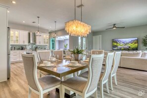 Host lavish dinners in our dining room, where a luxury table and comfortable chairs accommodate eight guests