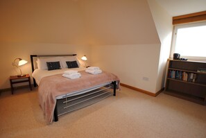 The spacious main bedroom is on the first floor