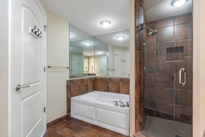 After a fun day on the beach, sink into the soaker tub with a glass of wine.
