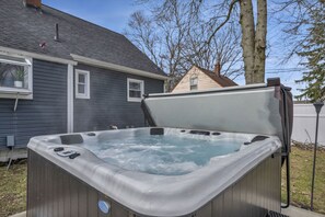 Indulge in ultimate relaxation as you unwind in our private hot tub, surrounded by the enchanting glow of twinkling evening skies.