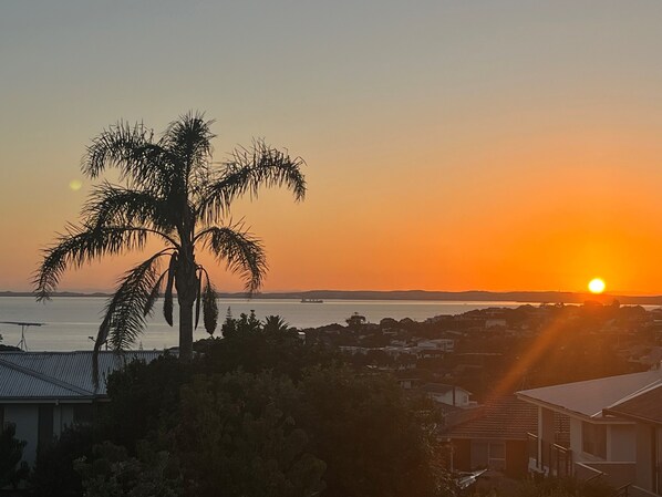 Sunrise over Rangitoto Island (volcano) from main deck