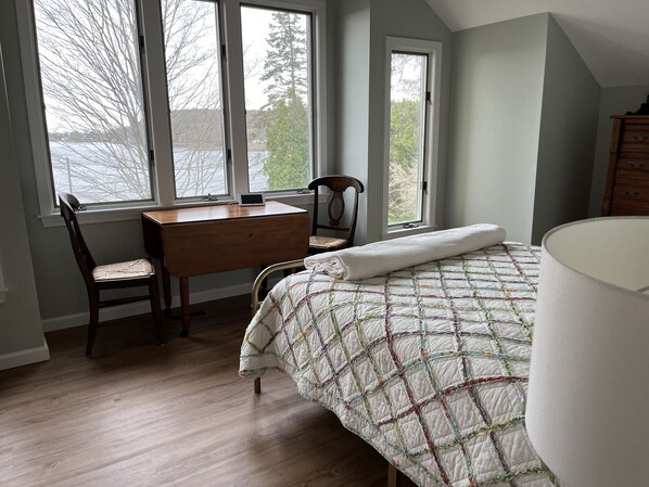 The bedroom with beautiful views out to the river