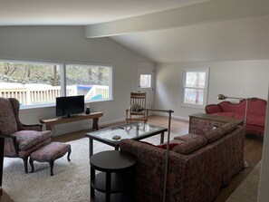 Living room out to the back deck. 