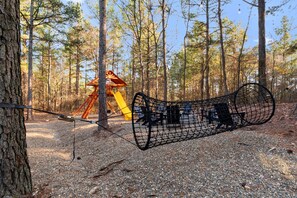 Fun in the forest: our outdoor play area is a haven for kids and the young at heart.