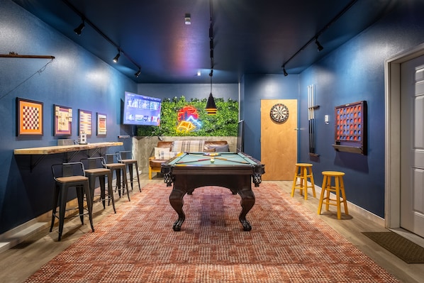 Game room - pool table, ping-pong, darts, checkers, weight room, Roku-TV