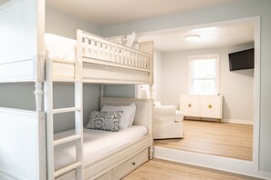 Guest bedroom with bunkbeds & trundle bed for extra sleeping arrangements