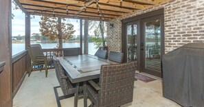 Downstairs lakeview patio complete with grill upstairs and downstairs.