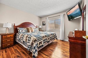 Large master bedroom offers a relaxing retreat after a fun day of adventure.