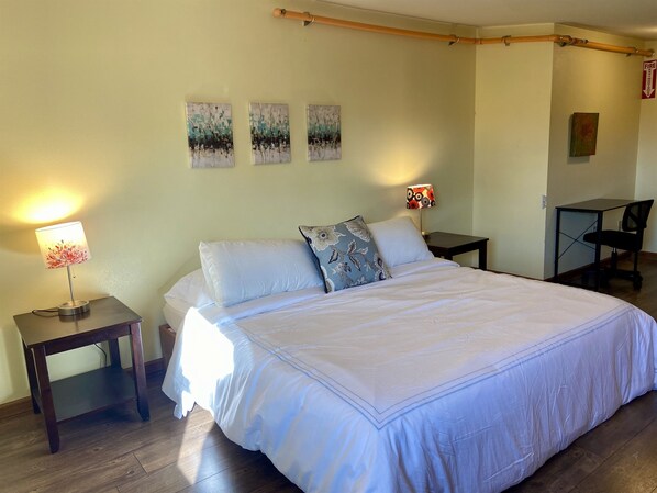 King bed in upper bedroom of Eclipse Condo.