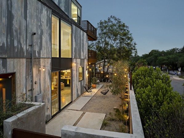 Stunning private courtyard with architectural lighting and a fountain